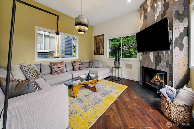 444 26th Ave E, Seattle, WA 98112 - living room with dark wood-style floors and a fireplace