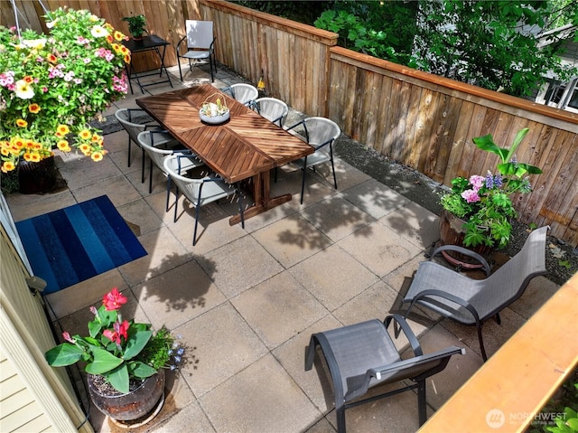 444 26th Ave E, Seattle, WA 98112 - fenced backyard featuring a patio area and outdoor dining area