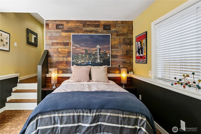 444 26th Ave E, Seattle, WA 98112 - carpeted bedroom featuring an accent wall and wooden walls