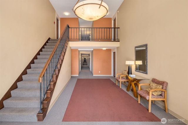 11012 NE 68th St Unit 511, Kirkland, WA 98033 - stairs featuring carpet and a towering ceiling
