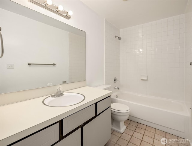 11012 NE 68th St Unit 511, Kirkland, WA 98033 - bathroom featuring vanity, tile patterned flooring, and tub / shower combination