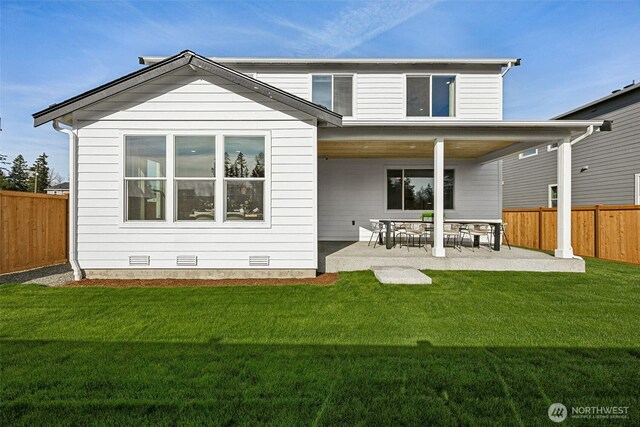 13912 181st St E Unit 62, Puyallup, WA 98374 - rear view of house with a patio