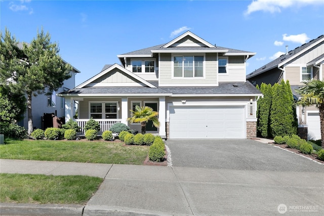 20325 90th Pl S, Kent, WA 98031 - view of front facade with driveway, a garage, a porch, a front lawn, and roof with shingles