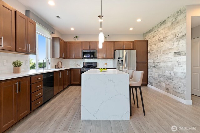 20325 90th Pl S, Kent, WA 98031 - kitchen with stainless steel appliances, baseboards, a kitchen breakfast bar, recessed lighting, and a kitchen island