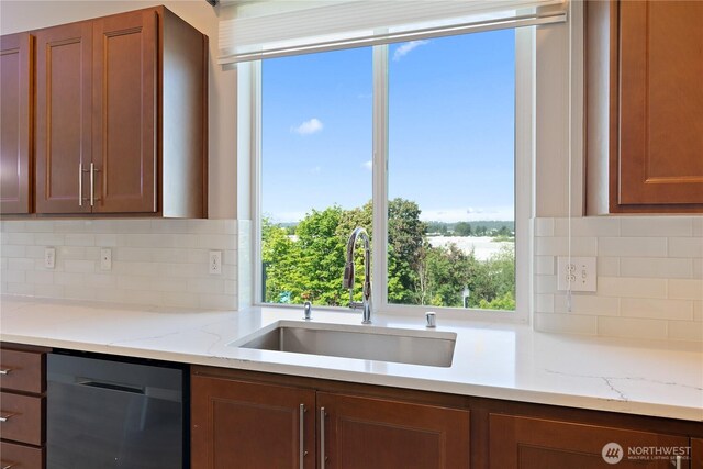 20325 90th Pl S, Kent, WA 98031 - kitchen featuring dishwasher, a sink, plenty of natural light, and backsplash