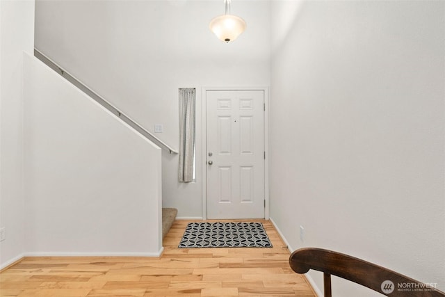 1082 G St SW, Tumwater, WA 98512 - foyer entrance featuring wood finished floors, stairs, and baseboards