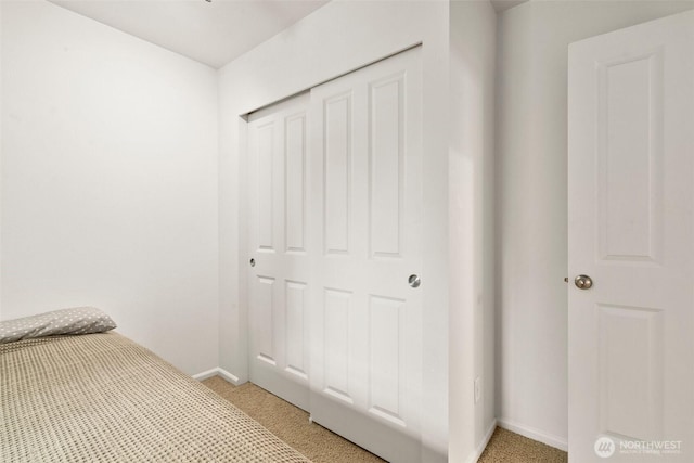 1082 G St SW, Tumwater, WA 98512 - unfurnished bedroom with light carpet, baseboards, and a closet