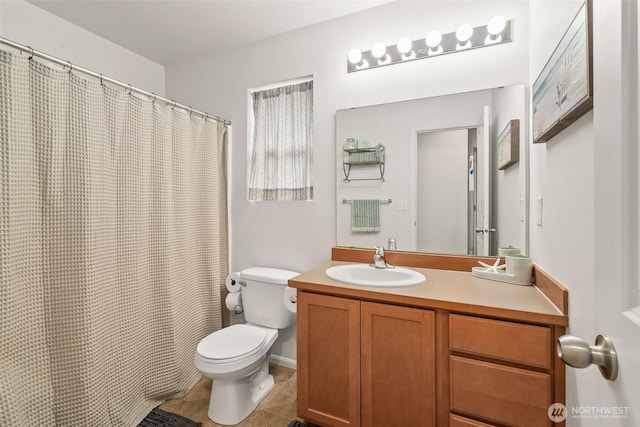 1082 G St SW, Tumwater, WA 98512 - bathroom with toilet, tile patterned floors, vanity, and curtained shower