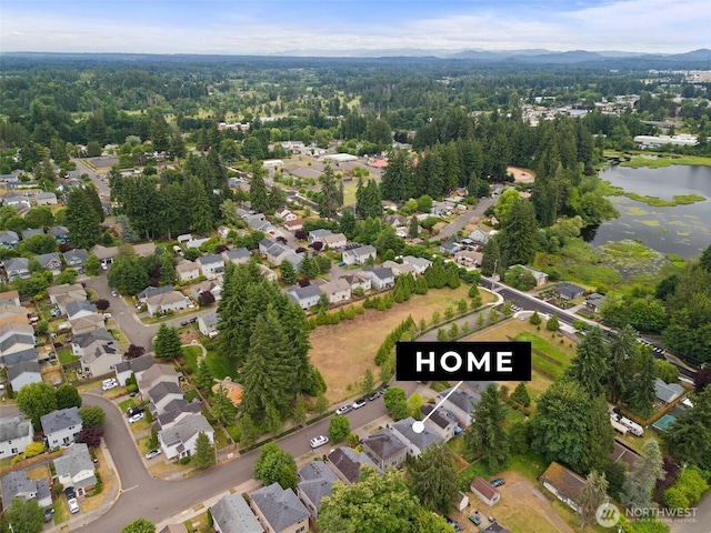 1082 G St SW, Tumwater, WA 98512 - aerial view of property's location with nearby suburban area and a nearby body of water