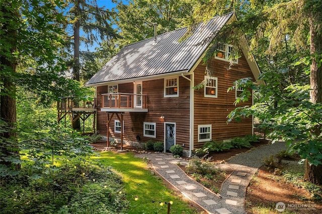 27603 145th Ave SW, Vashon, WA 98070 - back of property featuring metal roof and a wooden deck