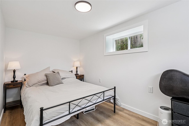 3007 23rd Ave S, Seattle, WA 98144 - bedroom featuring wood finished floors and baseboards