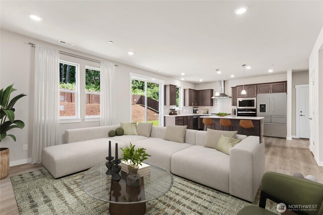3704 98th Avenue Ct E Unit 1, Edgewood, WA 98371 - living area with light wood-type flooring and recessed lighting