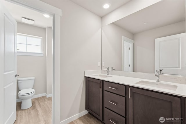 3704 98th Avenue Ct E Unit 1, Edgewood, WA 98371 - full bath with double vanity and wood finished floors