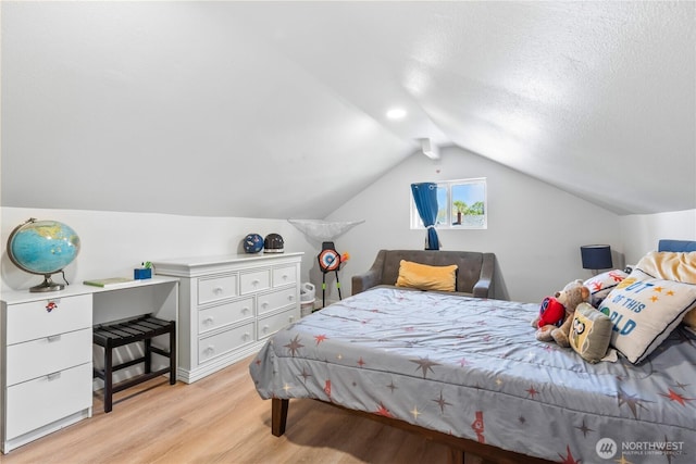 3628S Sheridan Ave, Tacoma, WA 98418 - bedroom with light wood finished floors, lofted ceiling, and a textured ceiling