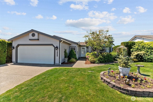1933 Windflower Ln SE, Lacey, WA 98503 - ranch-style house featuring a garage, driveway, and a front lawn