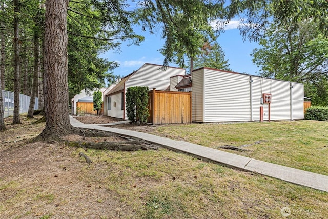 14600 SE 176th St Unit H11, Renton, WA 98058 - view of side of home featuring an outbuilding