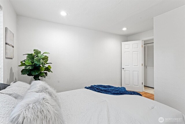 14600 SE 176th St Unit H11, Renton, WA 98058 - bedroom featuring wood finished floors and recessed lighting
