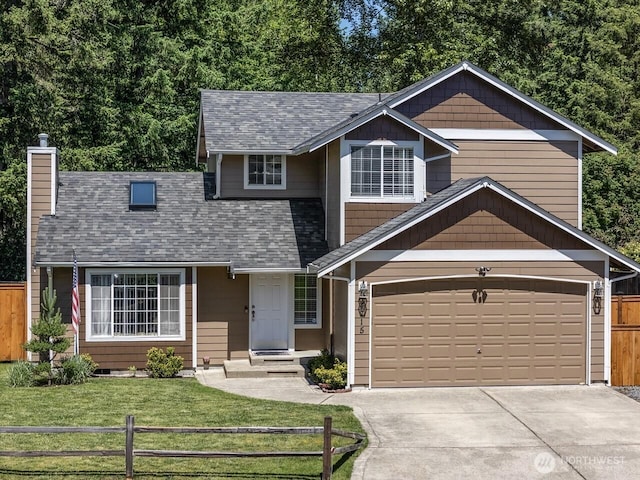 4715 247th St E, Graham, WA 98338 - view of front of home with driveway, a garage, a chimney, and roof with shingles