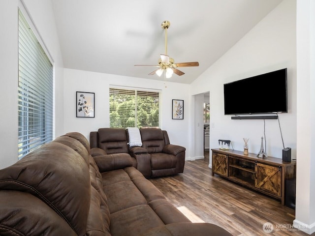 4715 247th St E, Graham, WA 98338 - living room with lofted ceiling, ceiling fan, wood finished floors, and baseboards