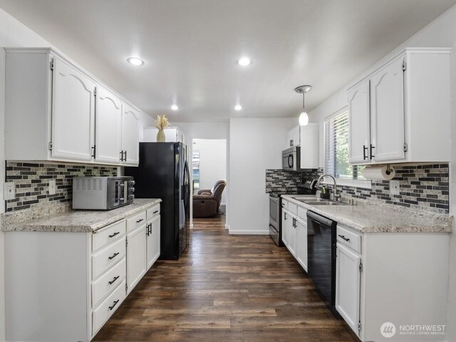4715 247th St E, Graham, WA 98338 - kitchen featuring black appliances, a sink, dark wood finished floors, white cabinets, and recessed lighting