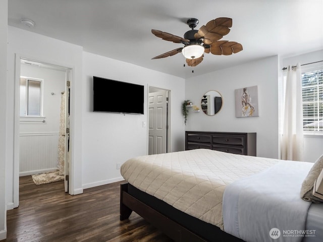 4715 247th St E, Graham, WA 98338 - bedroom with dark wood-style floors, baseboards, a ceiling fan, and a wainscoted wall