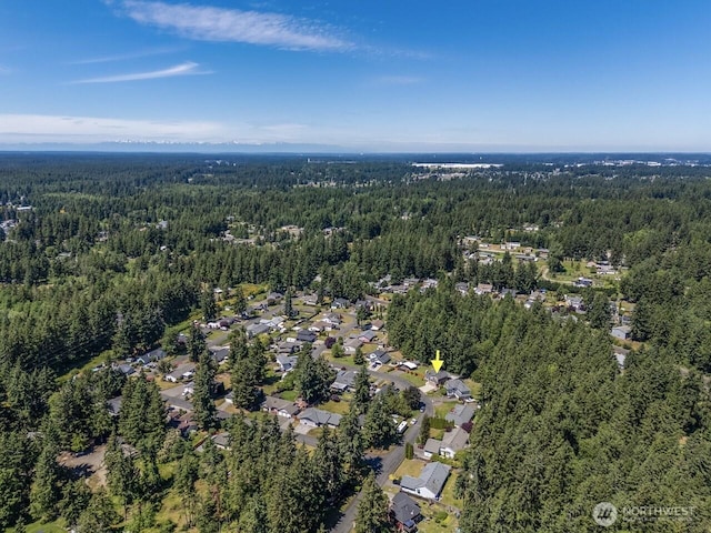 4715 247th St E, Graham, WA 98338 - aerial view of property and surrounding area featuring a heavily wooded area and nearby suburban area