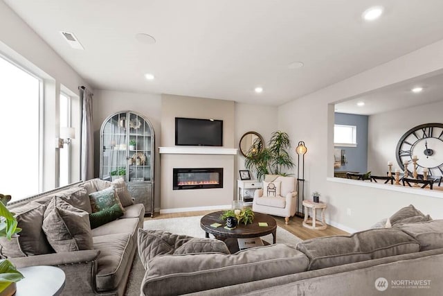 3905 98th Avenue Ct E Unit 33, Edgewood, WA 98371 - living area with recessed lighting, wood finished floors, and a glass covered fireplace