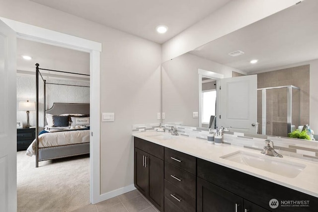 3905 98th Avenue Ct E Unit 33, Edgewood, WA 98371 - full bath featuring ensuite bath, double vanity, a stall shower, tile patterned flooring, and recessed lighting