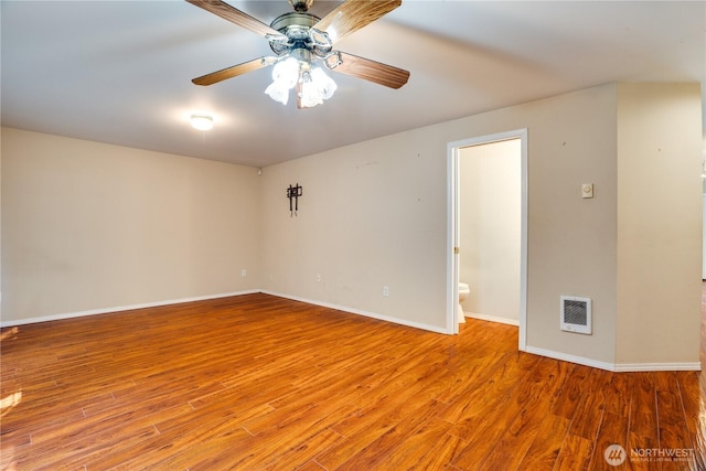10513 SE 250th Pl Unit F-106, Kent, WA 98031 - unfurnished room featuring light wood-type flooring and a ceiling fan