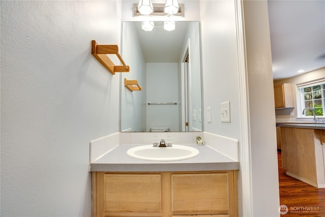 10513 SE 250th Pl Unit F-106, Kent, WA 98031 - bathroom featuring vanity and wood finished floors