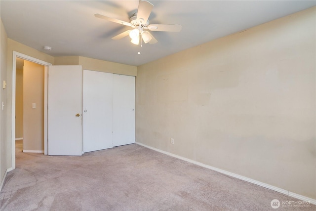 10513 SE 250th Pl Unit F-106, Kent, WA 98031 - unfurnished bedroom featuring carpet floors, a closet, and ceiling fan
