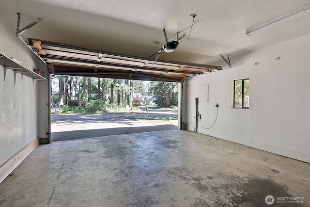 311 Edgecliff Dr, Langley, WA 98260 - garage featuring a garage door opener