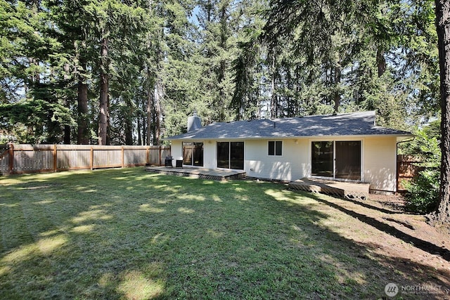 311 Edgecliff Dr, Langley, WA 98260 - back of house with a chimney and a patio