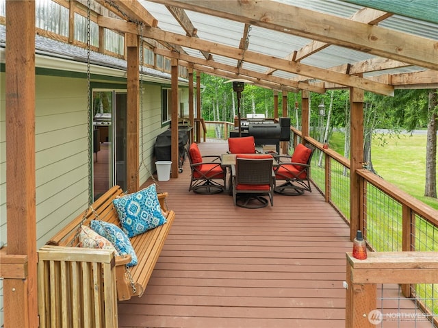 132 River Park Rd, Forks, WA 98331 - wooden terrace with outdoor dining area and a yard