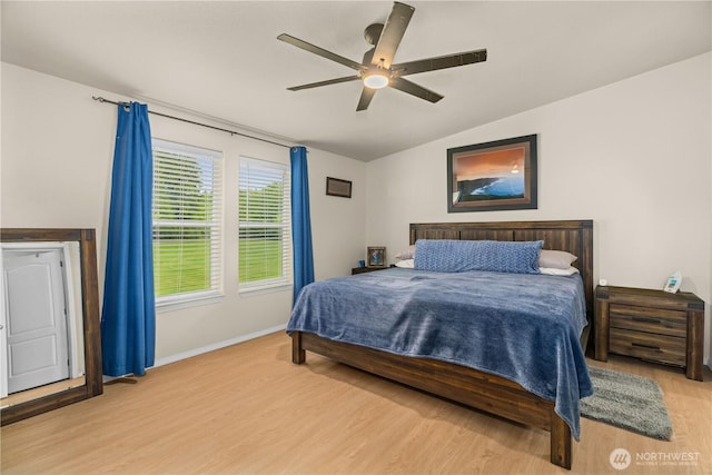 132 River Park Rd, Forks, WA 98331 - bedroom featuring light wood-type flooring, lofted ceiling, baseboards, and ceiling fan