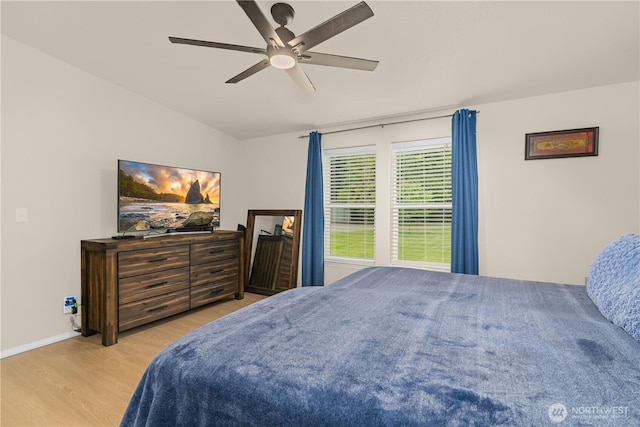 132 River Park Rd, Forks, WA 98331 - bedroom featuring wood finished floors, a ceiling fan, and baseboards