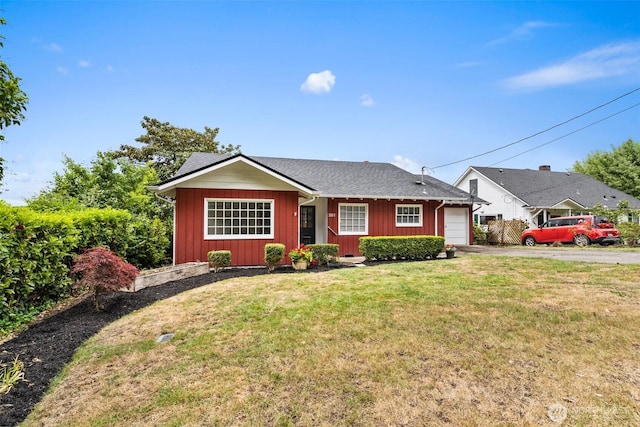 261 SE Adams Ave, Chehalis, WA 98532 - single story home with asphalt driveway, an attached garage, and a front yard