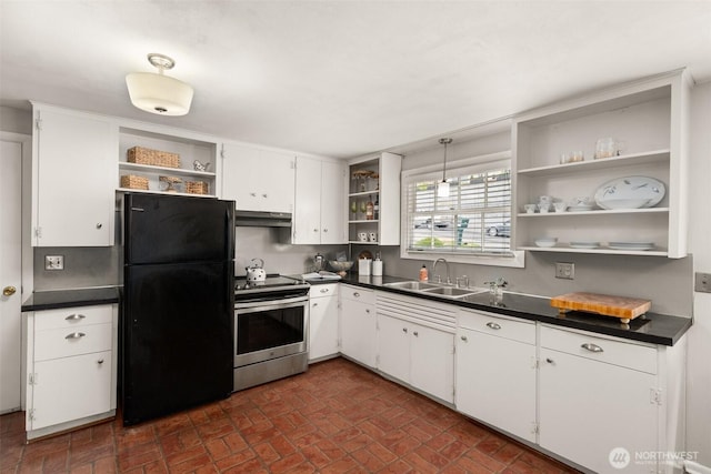 261 SE Adams Ave, Chehalis, WA 98532 - kitchen featuring open shelves, stainless steel electric range oven, freestanding refrigerator, a sink, and dark countertops