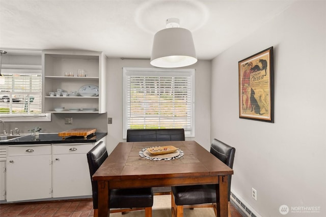 261 SE Adams Ave, Chehalis, WA 98532 - dining area featuring brick patterned flooring