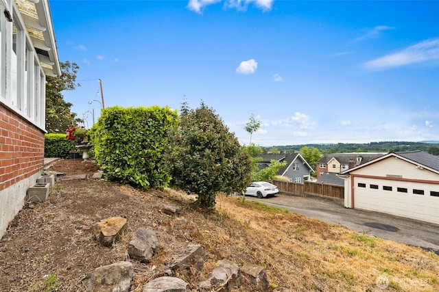 261 SE Adams Ave, Chehalis, WA 98532 - view of yard with a garage and a residential view