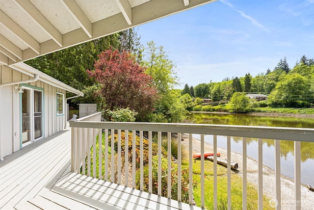 8471 E Caraway Rd, Port Orchard, WA 98366 - wooden terrace featuring a water view and view of wooded area