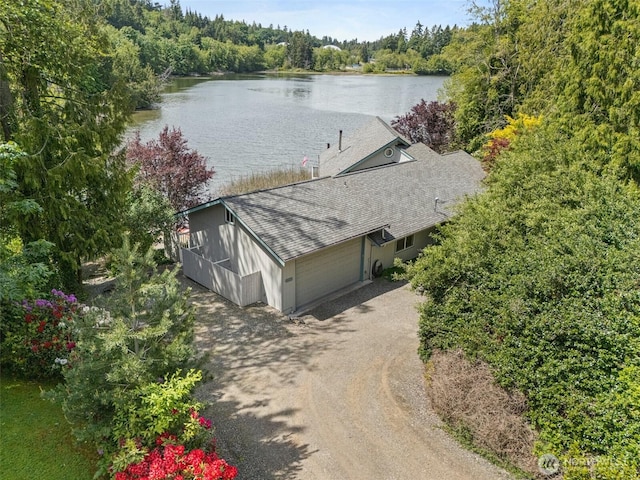 8471 E Caraway Rd, Port Orchard, WA 98366 - aerial view of property and surrounding area featuring a nearby body of water and a heavily wooded area