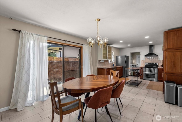 1011 Idaho St, Wenatchee, WA 98801 - dining room featuring a chandelier, light tile patterned floors, baseboards, and recessed lighting