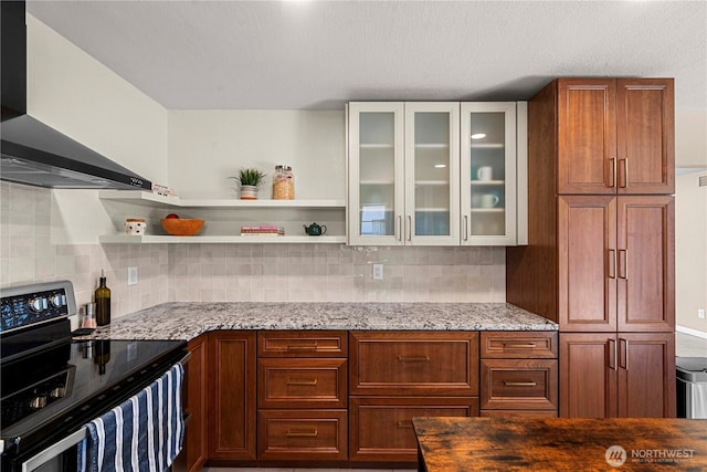 1011 Idaho St, Wenatchee, WA 98801 - kitchen with black / electric stove, wall chimney range hood, open shelves, light stone counters, and a textured ceiling