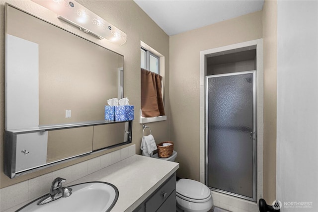 1011 Idaho St, Wenatchee, WA 98801 - bathroom featuring toilet, vanity, and a stall shower