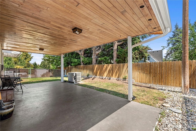 1011 Idaho St, Wenatchee, WA 98801 - fenced backyard with a patio area and cooling unit