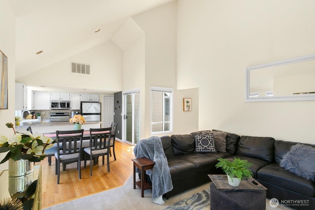 4754 SW 314th Pl, Federal Way, WA 98023 - living area with light wood-style floors and high vaulted ceiling