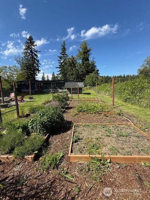 14518 Kapowsin Hwy E, Graham, WA 98338 - view of yard featuring a garden