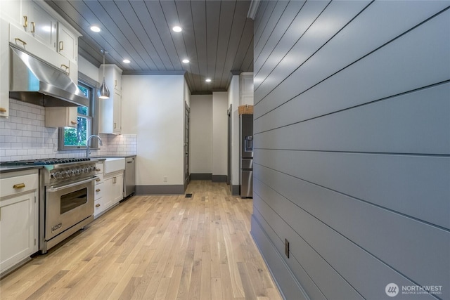 366 S Palouse St, Walla Walla, WA 99362 - kitchen with appliances with stainless steel finishes, a sink, light wood-style flooring, recessed lighting, and tasteful backsplash