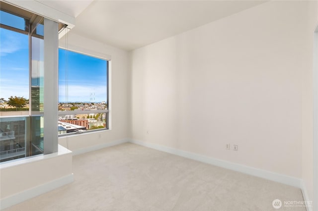737 Olive Way Unit 2704, Seattle, WA 98101 - unfurnished room featuring carpet floors and baseboards